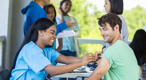 Patient getting a flu shot at his local hospital.